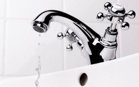 What makes the bathroom faucet drip ?