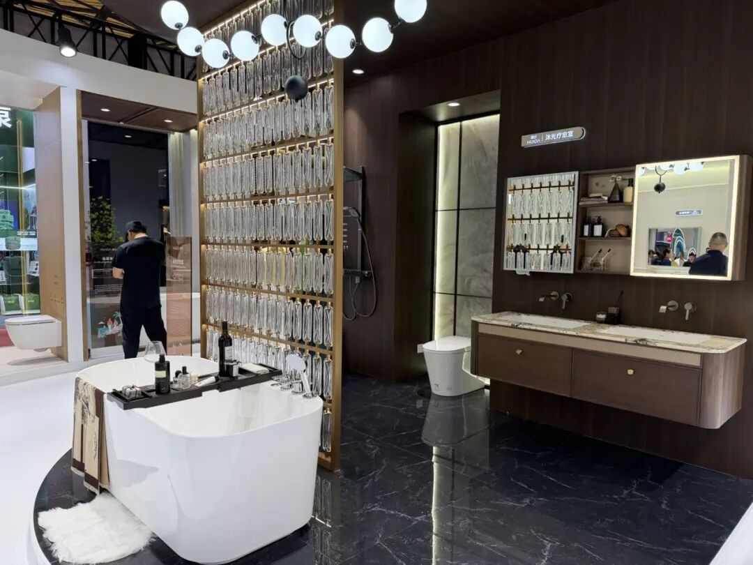 Modern bathroom vanity with wood-grain cabinet and round mirror showcased at 2026 Shanghai Kitchen & Bath Expo